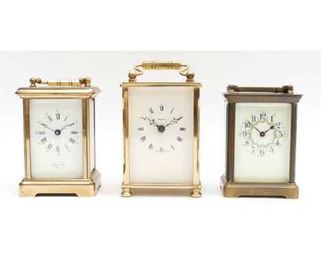 Three mid to late twentieth century brass carriage clocks, housing eight day movements, to include, a Bornand Freres example,
