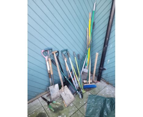 A collection of garden hand tools, to include spades,forks, shears, rakes, together with a group of various sixed garden plan