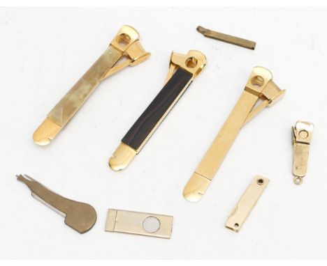 A collection of smoking pipe cutters and pipe tools, of various styles and sizes. (1 bag)