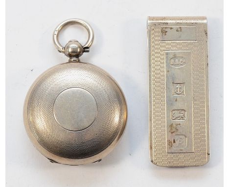 A silver sovereign case, lacking push button, 1904, together with silver money clip, Birmingham 1989, 39gm. (2)