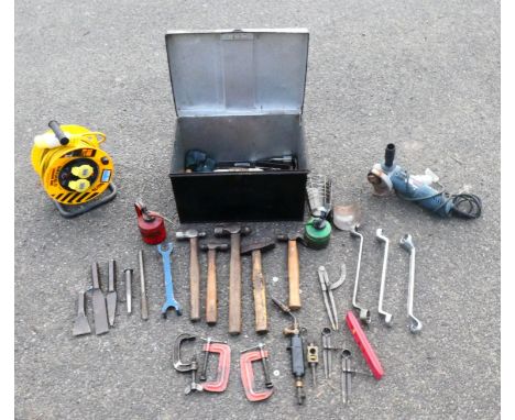 A metal tool box containing a selection of engineering hand tools to include hammers, 'G' clamps, cold chisels and measuring 