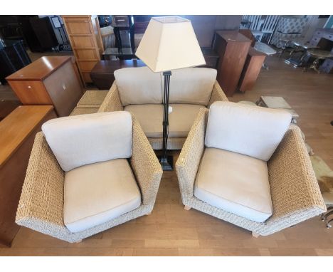 A contemporary rattan five piece conservatory suite, comprising two seater sofa, W150, D88, H86cm, two armchairs, W94, and tw