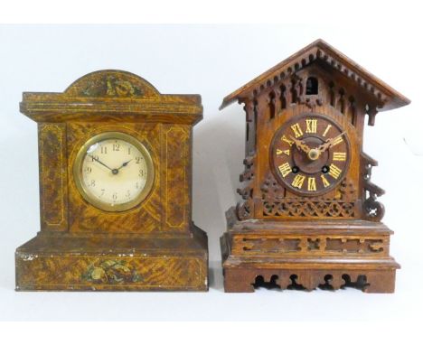 Two mantel clocks, to include a German Black Forest example, H-34cm, and a tin mantel clock with musical decoration to the co