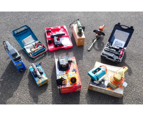 A Plasplugs 'Master Sharp' modular sharpening system, a Black and Decker DNJ4506-7240v 315w hedge trimmer, a Power Devil PDRT