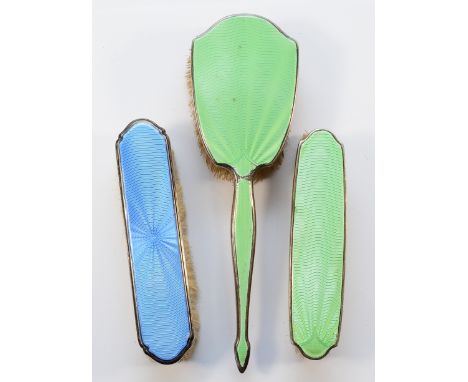A silver and green guilloche enamel  dressing table hair brush, London 1872, together with a matching clothes brush, London 1