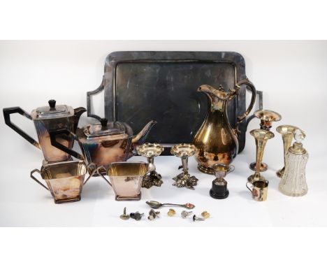 A silver pair of flower vases, Birmingham 1899, 14cm, loaded, a small silver cup, a five piece electroplated tea/coffee servi