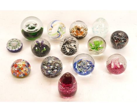A collection of fourteen 20th century paperweights, to include Caithness and Wedgwood examples. (14)
