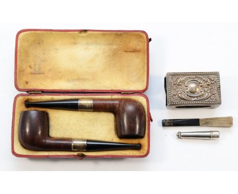 A pair of  silver mounted briar pipes, London 1919, in original London made case, together with a silver matchbox holder, Bir