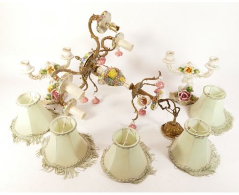 A twentieth century chandelier style ceramic light fitting, with multi-coloured floral decoration and brass branches, complet