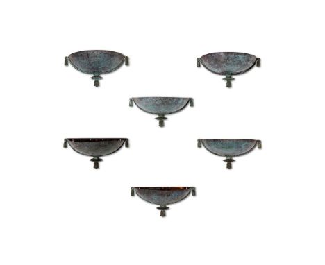 A SET OF SIX FRENCH VERDIGRIS PATINATED METAL WALL BRACKETS  EARLY 20TH CENTURY  Formerly fitted as lights  Approximately 37.