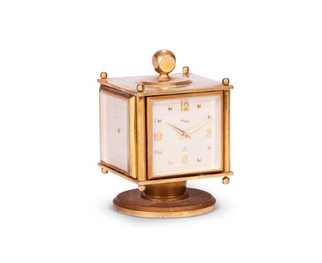 A SWISS BRASS FOUR SIDED DESK COMPENDIUM  BY IMHOF, 1950s  Timepiece with 8 day movement, engraved to the reverse 1429519 and