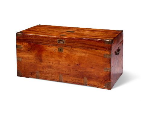 A VICTORIAN CAMPHOR WOOD AND BRASS BOUND CAMPAIGN TRUNK MID 19TH CENTURY With brass plaque inscribed 'Higgins' 47cm high, 103
