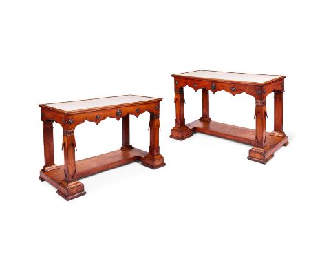 A PAIR OF BALTIC FRUITWOOD AND EBONISED CONSOLE TABLES CIRCA 1835 Incorporating an unusual combination of Neoclassical and Ne