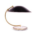 A BRASS AND LUCITE DESK LAMP BY THE BAUER LAMP COMPANY, 1983