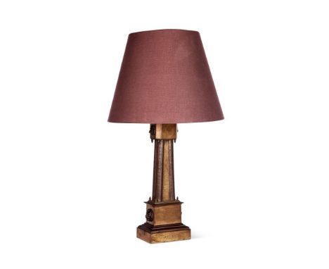 A LARGE BRONZE AND COPPER TABLE LAMP  LATE 19TH CENTURY  The relief panels depicting hunting scenes  67cm high (excluding sha