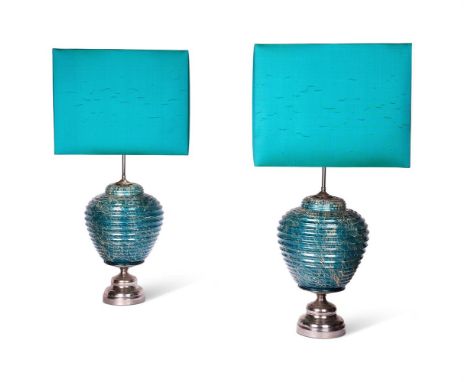 A PAIR OF ITALIAN BLUE CERAMIC AND NICKEL TABLE LAMPS  1970s  Blue ribbed ceramic urn shaped lamps with silver drizzle detail