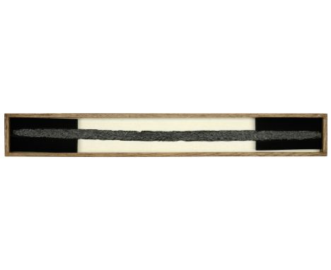 British Iron Age, Late First Millennium BC, Sword Money, a large sword-shaped iron currency bar, short hilt, narrow elongated