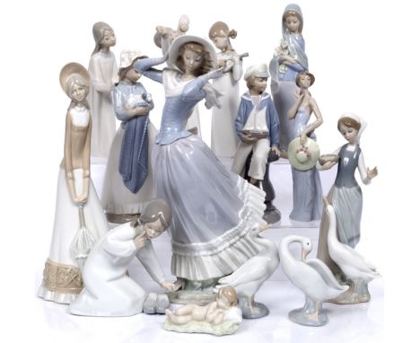 A collection of Lladro and Nao figures (14)