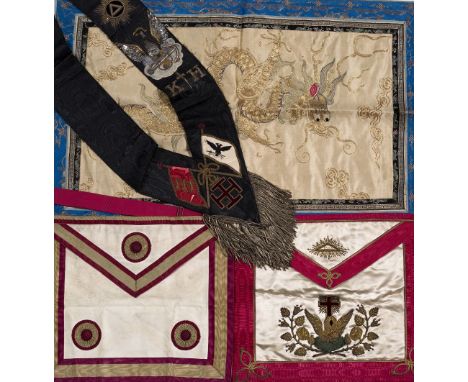 A Masonic Knights Hospitallers sash and three Masonic aprons