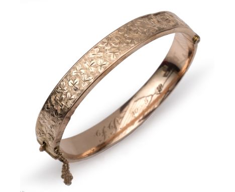 A 9ct gold bangle 10.7 grams