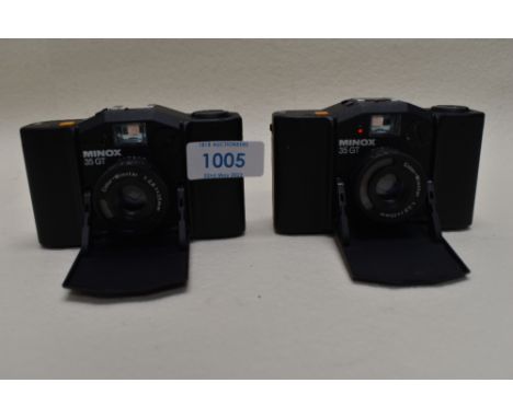 Two Minox 35GT cameras one with original case