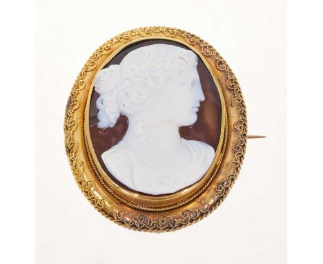 Fine quality 19th century Italian carved sardonyx cameo depicting a classical female bust in profile, in a gold brooch mount 