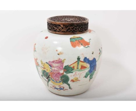 19th century Chinese famille verte jar and carved wood cover, decorated with an Immortal on a Qilin and other figures, total 