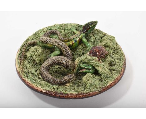 Small Palissy ware dish decorated with a snake, lizard and beetle, marked 'M. Mafra Caldas Portugal', 18cm diameter