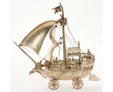 Late 19th century Dutch silver neff, in the form of a galleon under full sail, with separate hull, mounted on four wheels, Du