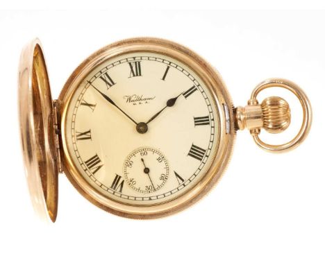 Waltham gold plated full hunter pocket watch with button wind movement in a gold plated case with engine turned decoration, 5