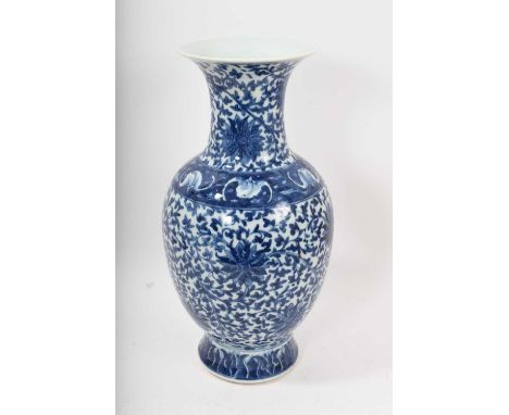 Early 20th century Chinese blue and white porcelain baluster vase, decorated with scrolling lotus flowers, 39cm high, and a C