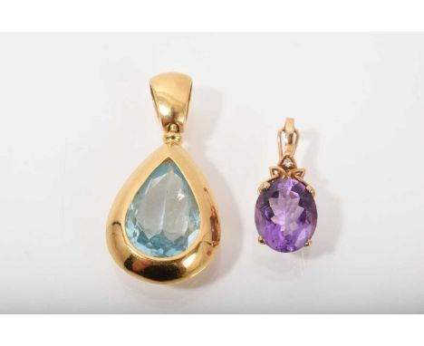 Blue topaz pear shape pendant in 18ct yellow gold setting and 9ct gold amethyst and diamond pendant Blue topaz pendant weighs