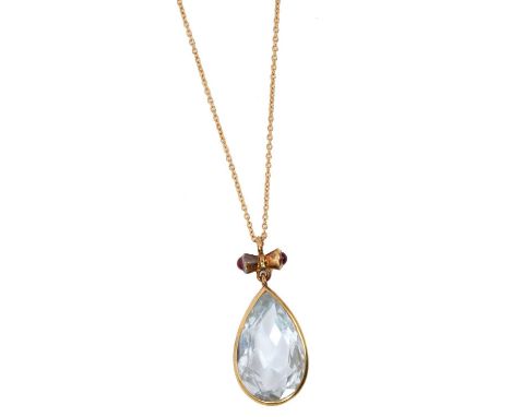 Aquamarine and ruby pendant with a large pear cut aquamarine measuring approximatley 23mm x 14mm x 7.4mm, in a gold rub over 