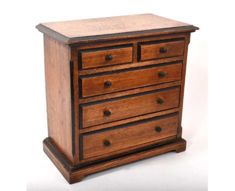 19th century miniature oak chest of drawers, work two short over three long graduated drawers on bracket feet, 30cm wide x 17