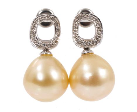 Pair of cultured pearl and diamond earrings, each with a large cultured pearl of pale gold/champagne tone, measuring approxim