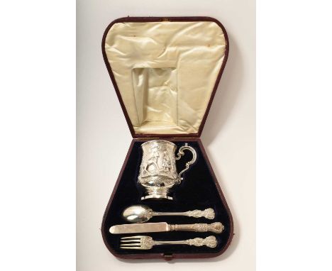 Early Victorian silver christening mug and three piece cutlery set, the mug with repoussé decoration, by Chawner &amp; Co (Ge