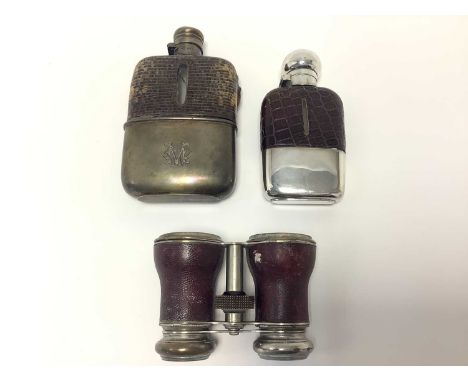 Victorian silver hip flask with glass body (mostly smashed), another hip flask with plated mounts and a pair of plated Jockey