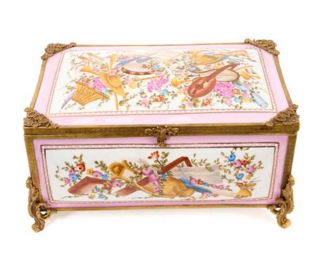 Russian Gardner porcelain brass-mounted jewellery casket, painted with musical instruments and flowers on a pink ground, 24cm