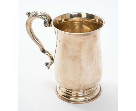 1940s one pint silver tankard of baluster form, with leaf mounted scroll handle (London 1943) Mappin &amp; Webb. All at appro