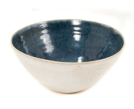 Lucie Rie and Hans Coper stoneware bowl, the exterior with speckled pale grey glaze, the interior blue, impressed marks, 14.5