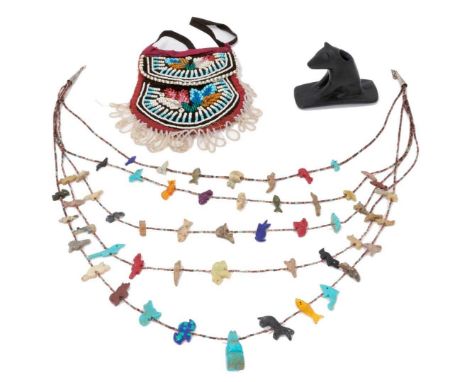 Group of Native American tribal artifacts, including a beadwork pouch, a Zuni fetish necklace, and an effigy pipe in the form