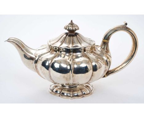 Good quality George IV silver melon form teapot, with engraved armorials, on splayed pedestal foot, by Benjamin Preston, Lond