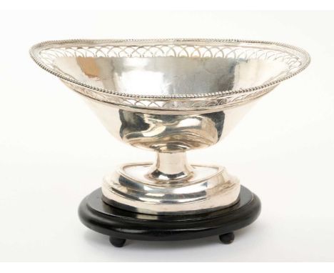 Early 19th century Dutch silver basket of oval form, with pierced and bead border, on an oval pedestal base and ebonised plin