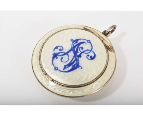 Early 20th century Russian silver and guilloché enamel pendant powder compact of circular form with blue monogram on white en