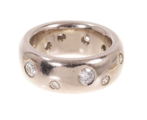 Handmade 18ct white gold diamond set ring with a wide band of brilliant cut diamonds in a scattered design in rub over settin