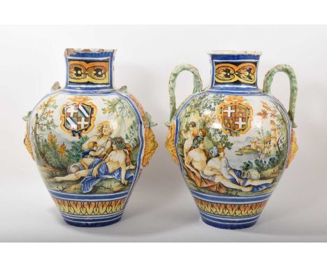 Pair of large Italian maiolica vases, painted with figural scenes and crests, dated 1789 with initials 'VR' verso, acanthus l