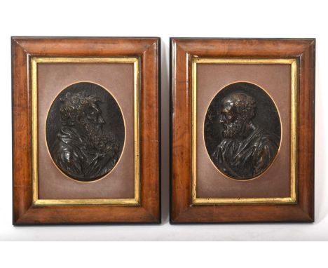 Pair of 19th century bronze plaques of St Peter and St Paul, each oval, 13 x 10cm in walnut cushion framesBoth in good order,