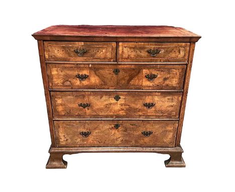 Early 18th century walnut crossbanded chest of two short and three long graduated drawers, with quarter veneered top, on spla