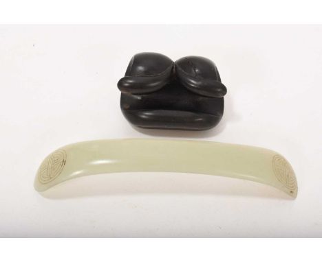 Antique Chinese celadon jade carving, possibly a hairpin, of bowed form with incised auspicious symbols, 12cm long, on carved