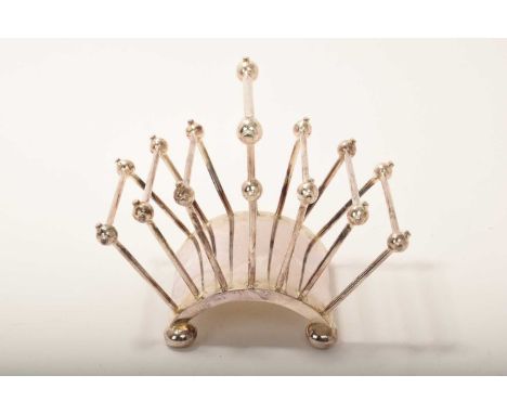 Christopher Dresser for Hukin and Heath, a silver plated six division toast rack, circa 1881, model 2556, 15cm wide x 12cm hi